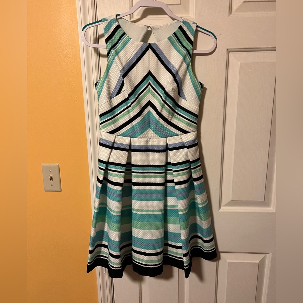 Young girls dress with pockets. Smoke free and animal free home.